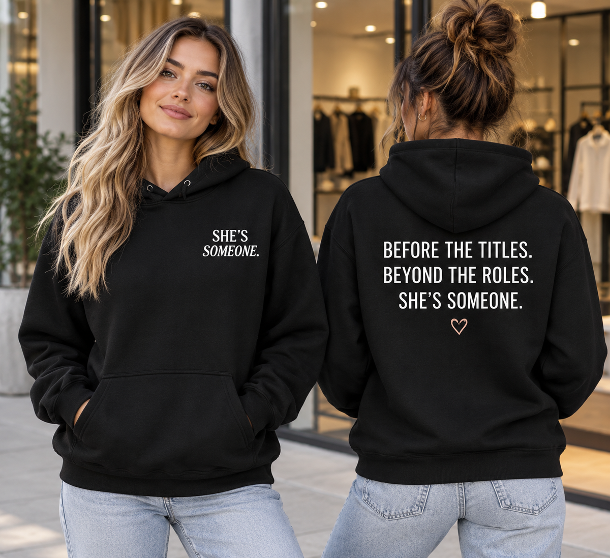 Women’s black She’s Someone Essential Hoodie front and back design