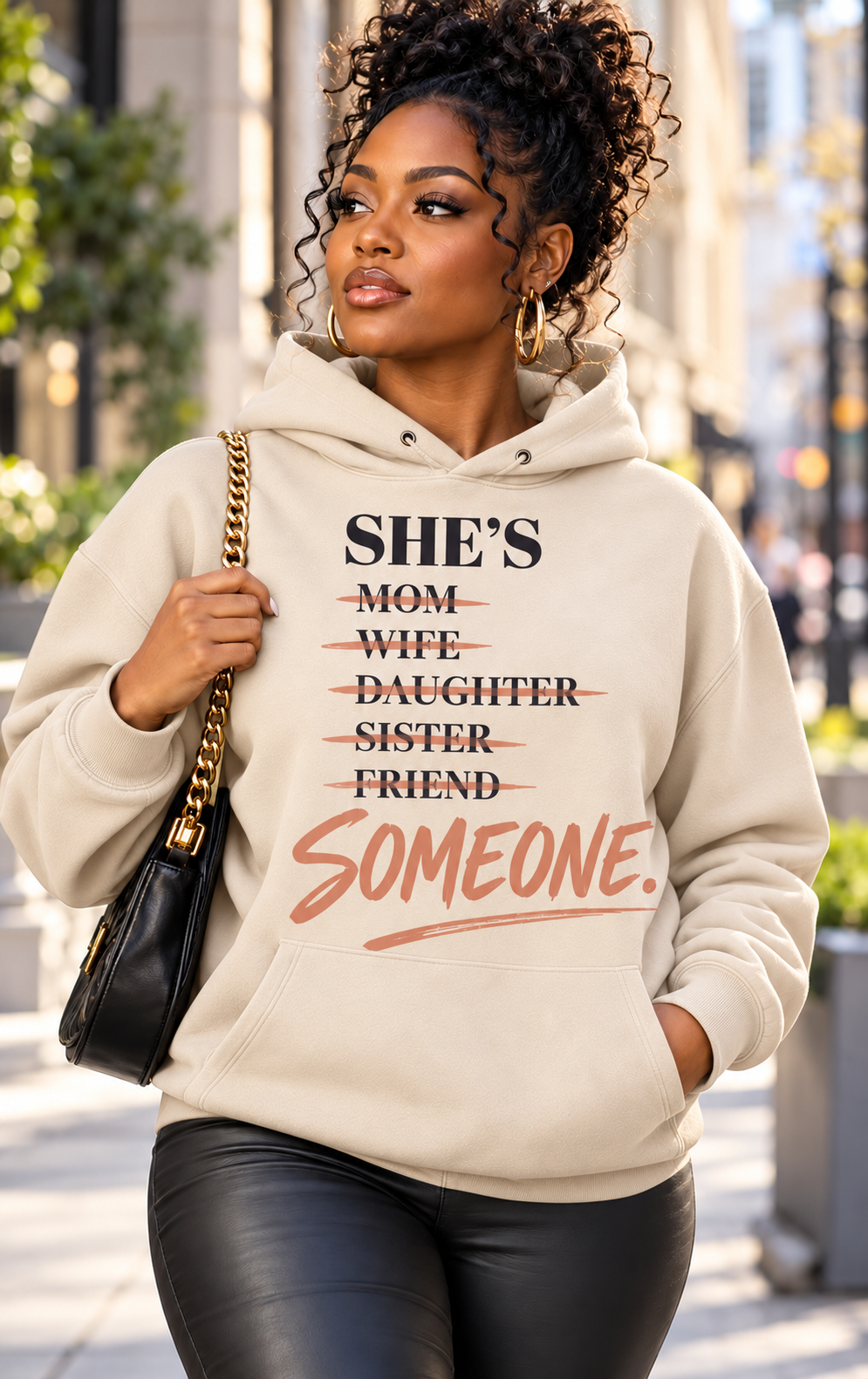 Women’s sand cream She’s Someone inspirational graphic hoodie